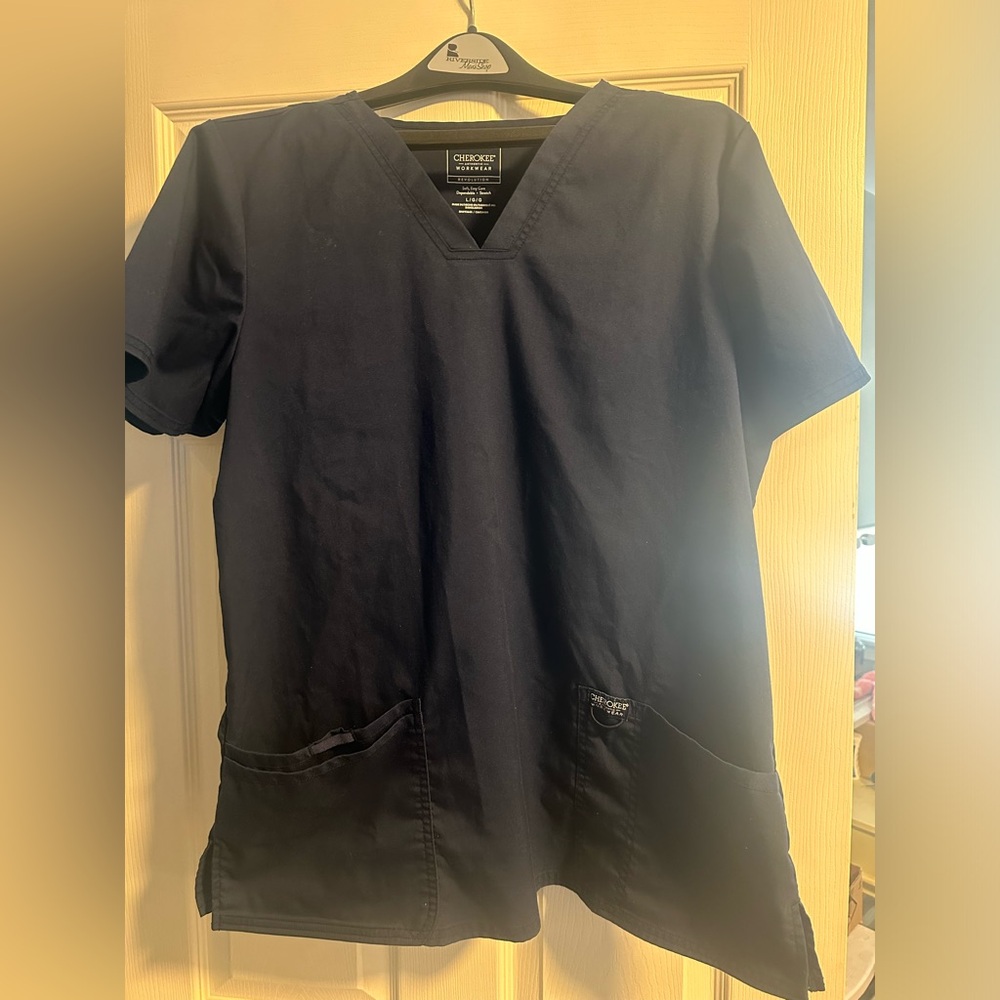 Cherokee Workwear woman scrub top never worn! Navy in color.
